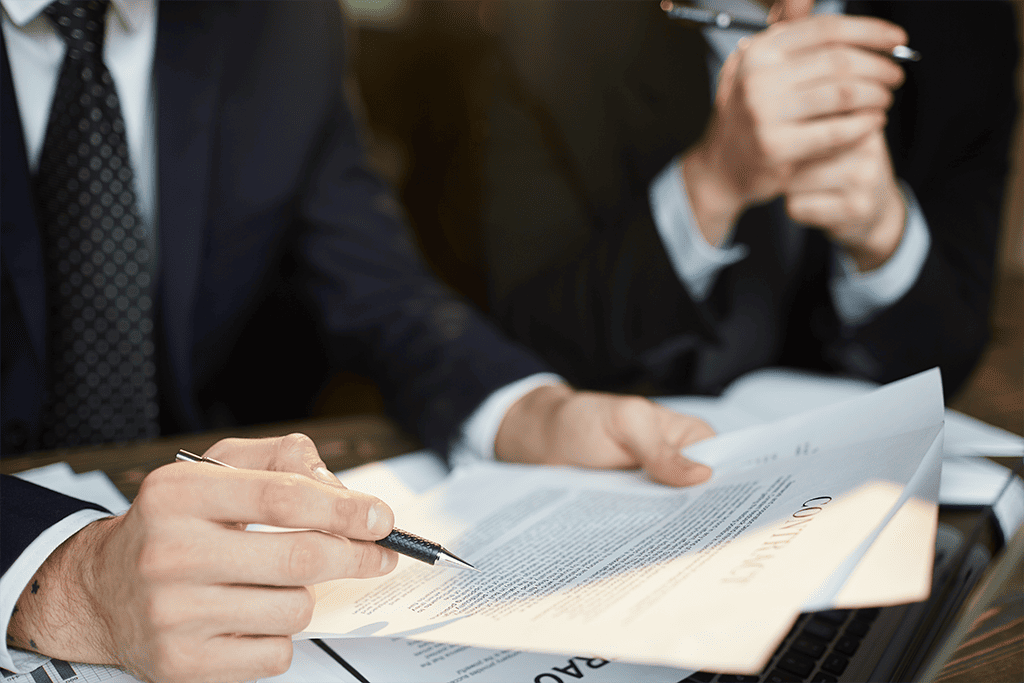 Person explaining legal matters with documents